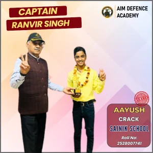 Captain Ranvir Singh congratulating Aayush for Sainik School success