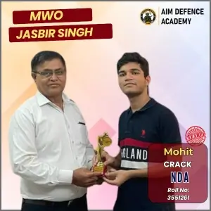 MWO Jasbir Singh honoring Mohit for NDA selection